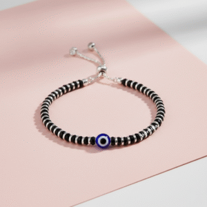 Adjustable Nazariya bracelet in pure silver with black beads with evil eye