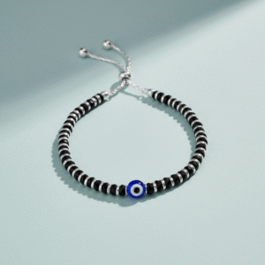 Adjustable Nazariya bracelet in pure silver with black beads with evil eye