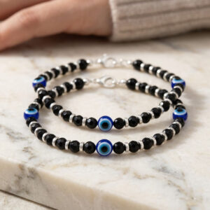 Baby nazariya in silver with 3 evil eyes and black beads