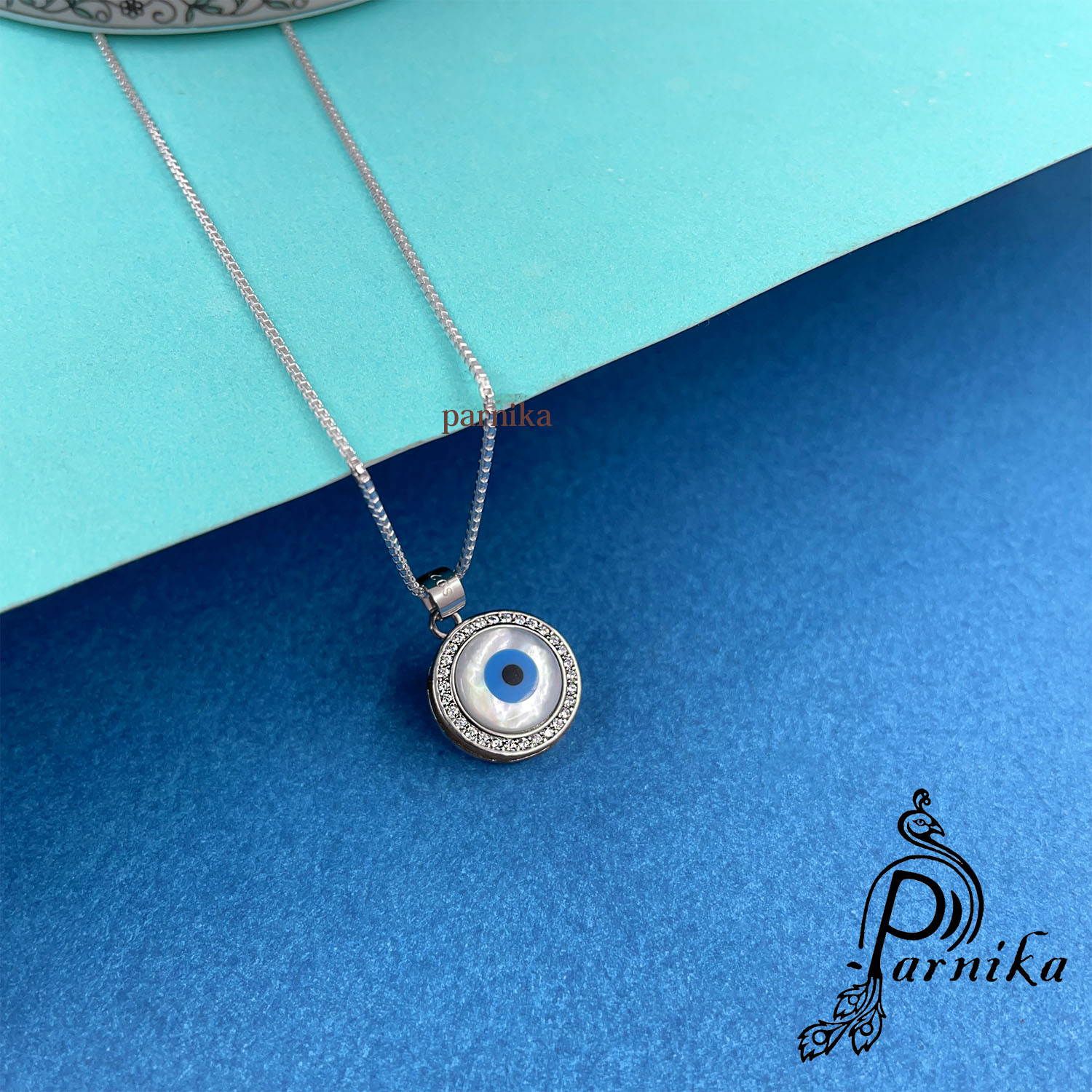 Round Evil eye design with cz solitaire pendent in pure silver Round Evil eye design with cz solitaire pendent in pure silver