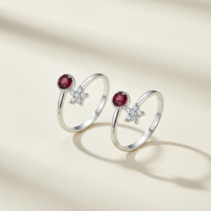 Top open silver toe ring with two stones red and white