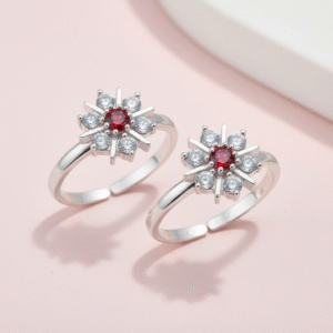 Toe ring in floral pattern with red gemstone in pure silver