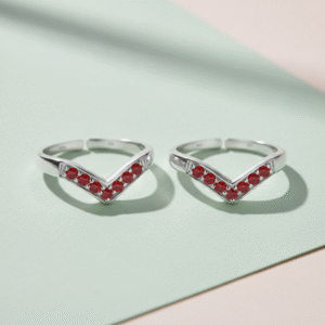 V shape silver toe ring with red stones