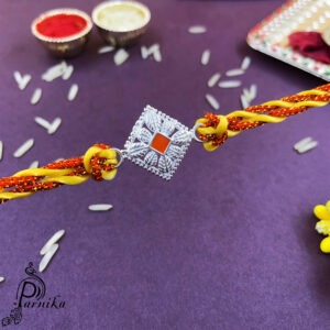 Pure silver rakhi in square shape with orange color at center
