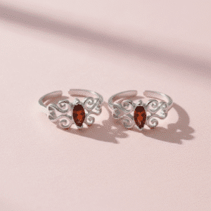 Toe ring with red gemstone oval in pure silver