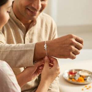 Flute with Mor Pankh Rakhi Bracelet in 925 Silver